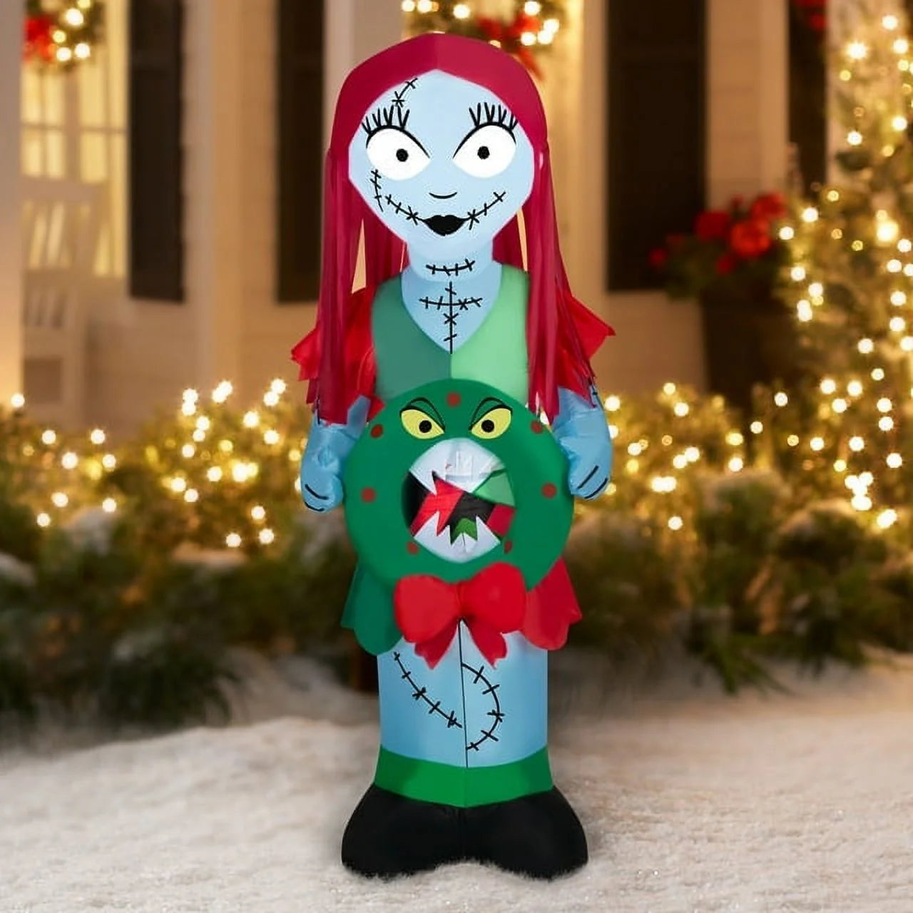 5.5 Foot Stylized Jack Skellington Inflatable with Spider Snowflake and Sally Holding Wreath J807